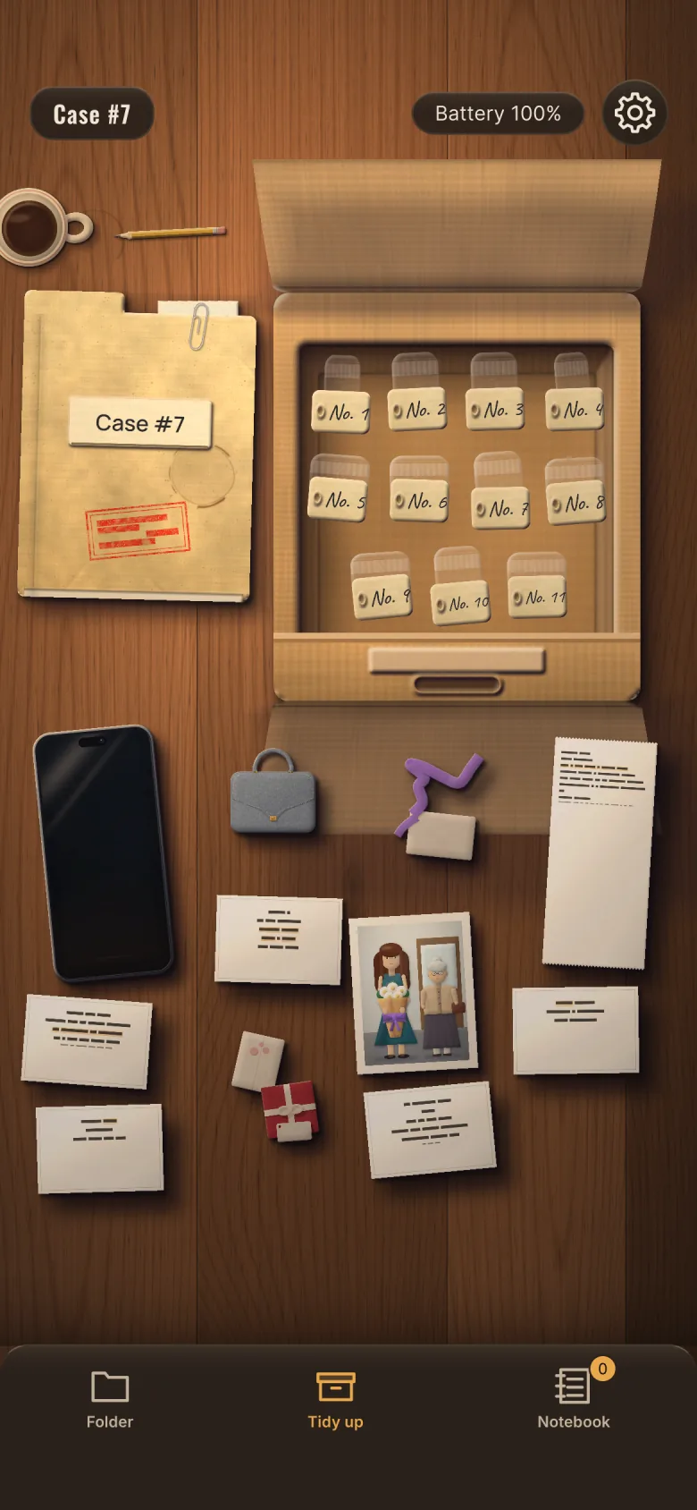 Evidence from the box spread on the desk: a phone, a bag, photos, tickets and notes next to the case folder